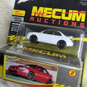 Mecum Auctions 2006 Subaru Impreza Wrx White Diecast Car